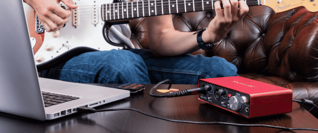 Plug electric guitar into garageband